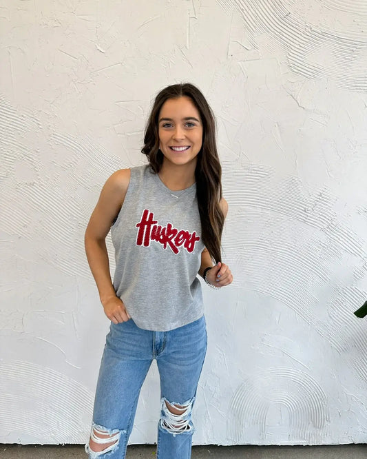 RED/ WHITE HUSKERS SCRIPT - GREY MUSCLE TANK